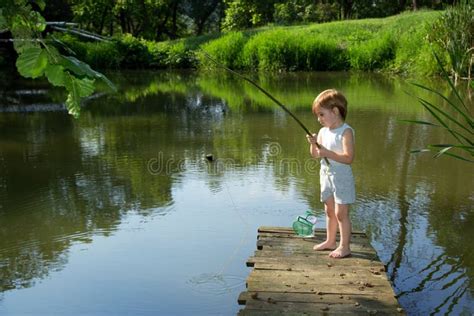 boy fishing|4,176 Little Boy Fishing Stock Photos .